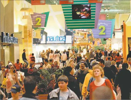  ?? DAN HALE / CHARLOTTE OBSERVER ?? Economists warn that malls will soon be less crowded as U.S. consumers curb spending due to low savings rates and high debt loads.