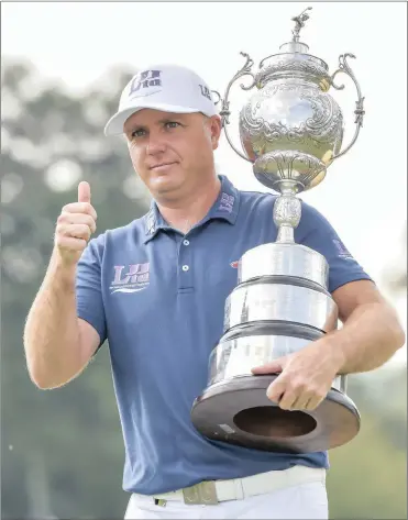  ?? Picture: CHRISTIAAN KOTZE, BACKPAGEPI­X ?? COOL STORM: SA Open winner Graeme Storm poses with his trophy at Glendower yesterday.