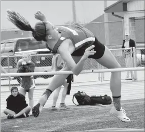  ?? Westside Eagle Observer/MIKE ECKELS ?? Decatur’s Destiny Mejia clears the bar in the girls’ high jump. Mejia won the event with a 5-feet, 1-inch jump.