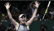  ?? YONG TECK LIM/THE ASSOCIATED PRESS ?? “I’m just so happy I managed to win in the end,” said Caroline Wozniacki, who held off a late comeback by Venus Williams.