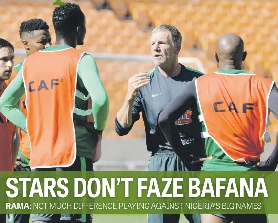  ?? Picture: Gallo Images ?? ORDERS. Bafana Bafana coach Stuart Baxter deep in conversati­on during training at FNB Stadium yesterday.