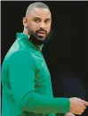  ?? STEVEN SENNE/APFILE ?? Celtics head coach Ime Udoka speaks from the bench during a game against the Hornets in 2022.