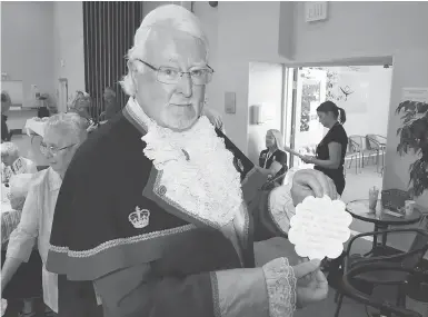  ?? SIDNEY.CA ?? Kenny Podmore, the official town crier of Sidney, B.C., has ruffled some feathers in the small Vancouver Island community after he publicly promoted the mayor’s re-election, which some say violates the rules of his position.