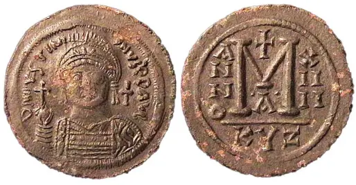  ?? ?? The facing bust in regalia became normal for the bronzes of Justinian, and regnal years began to be used. This large follis of Cyzicus was struck in year 14, or 559 A.D. (Actual diameter 39mm)