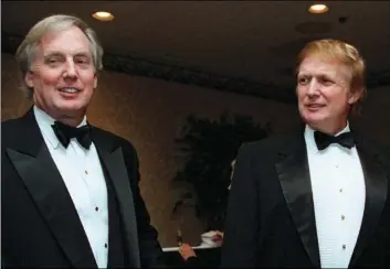  ?? BONADREFF
AP PHOTO/DIANE ?? In this 1999 file photo, Robert Trump (left) joins then real estate developer and presidenti­al hopeful Donald Trump at an event in New York.