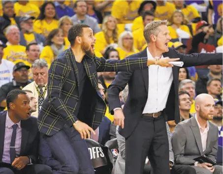  ?? Scott Strazzante / The Chronicle ?? The Warriors’ Stephen Curry and Steve Kerr get a tad animated during the fourth quarter of their Game 2 victory.