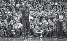  ?? AP PHOTO ?? Cleveland Cavaliers forward LeBron James gestures during the second half of Sunday’s Game 7 of the NBA basketball Eastern Conference finals against the Boston Celtics.