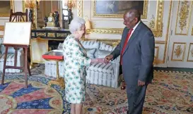  ?? (AFP) ?? This file photo shows Britain’s Queen Elizabeth II greeting South Africa’s President Cyril Ramaphosa during an audience at Windsor Castle, Berkshire, on April 17, 2018