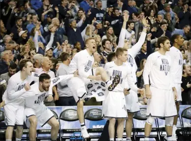  ?? The Associated Press ?? Villanova’s bench reacts to a 71-59 quarter-final win over Texas Tech in the NCAA men’s basketball tournament, Sunday.