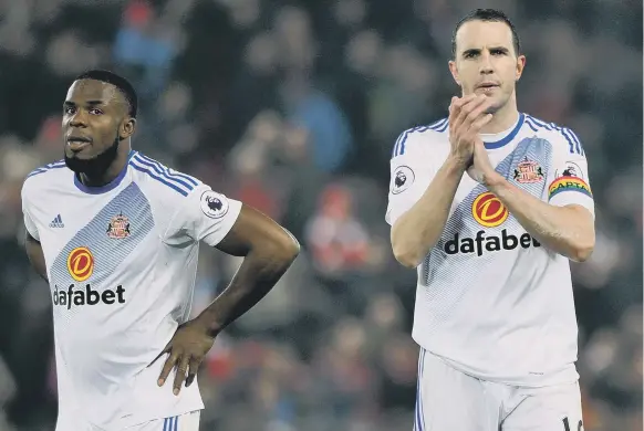  ??  ?? Sunderland captain and true leader John O’Shea with Victor Anichebe at the end of a recent match