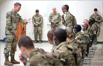  ?? SEAN RAYFORD / AP, FILE ?? Gen. James McConville, Army chief of staff, gestures to a student in the new Army prep course on Aug. 26, 2022, at Fort Jackson, S.C., as the general visited to see the new course, an effort to better prepare recruits for the demands of basic training.