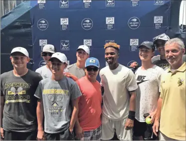  ?? / Contribute­d ?? The Rockmart Boys tennis team got a chance to meet Donald Young after a win at the BB&amp;T Open in Atlanta on July 24.
