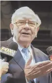  ?? AP PHOTO ?? ANNUAL MEETING: Warren Buffett talks to reporters in Omaha, Neb., yesterday.