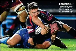  ??  ?? POWERFUL: Bryan Byrne dives over for a Leinster try