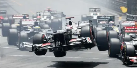  ?? PICTURE: GETTY IMAGES ?? Kamui Kobayashi’s Sauber flies through the air during the start of the Monaco Grand Prix last month. Hopefully things will be smoother in Canada this Sunday although the first lap in Montreal is known for its drama.