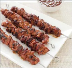  ??  ?? This undated photo provided by America’s Test Kitchen shows barbecued chicken kebabs in Brookline, Mass.