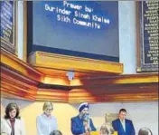  ?? PTI ?? Indiana lieutenant governor Suzanne Crouch, second from left, and chairman of Sikhs Political Affairs Committee Gurinder Singh Khalsa at a prayer in the Indiana senate on Friday.