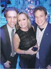  ??  ?? We Day’s Craig and Marc Kielburger joined Melita Segal for a night-before event above the swimming pool at her and husband Lorne’s home.