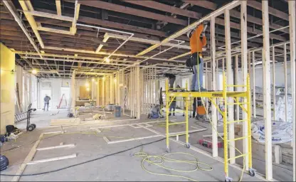  ?? Photos by Paul Buckowski / Times Union ?? The space being turned into apartments at 144 Clinton Street, seen here on Tuesday in Schenectad­y.