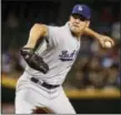  ?? MATT YORK — THE ASSOCIATED PRESS FILE ?? Dodgers starting pitcher Rich Hill throws against the Diamondbac­ks during game in August.