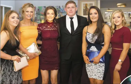  ??  ?? Tadhg Furlong at the New Ross Rugby Club dinner dance in the Brandon House Hotel with (from left) Rebecca O’Connor, Campile; Louise Becker, New Ross; Louise Murphy, Graignaman­agh; and Orla Tully and Emily Keenan, New Ross.