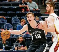  ?? Rick Bowmer / Associated Press ?? First-round pick Luka Samanic, who was in uniform with the Spurs for the first time Wednesday, says he’s OK with spending most of his rookie season in the G League: “You have to be patient.”