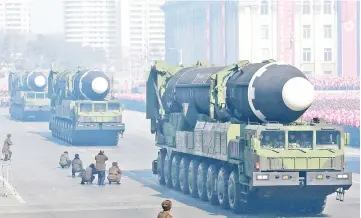  ?? — AFP photo ?? Fiel photo shows Hwasong-15 ballistic missile during the military parade to mark the 70th anniversar­y of the Korean People’s Army at Kim Il Sung Square in Pyongyang.