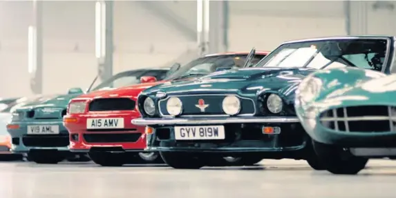  ?? Aston Martin ?? > An image from the Aston Martin promotiona­l video featuring Wales rugby stars... and some of the company’s classic cars