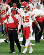  ?? (AP/Tyler Kaufman) ?? Kansas City Chiefs offensive coordinato­r Eric Bieniemy (left) is one of the top head coaching candidates. Bieniemy has been praised for his work with quarterbac­k Patrick Mahomes (right), who led the Chiefs to a Super Bowl title last season.