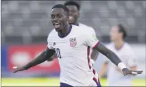  ?? FERNANDO LLANO — THE ASSOCIATED PRESS ?? Tim Weah celebrates his goal in the 11th minute Tuesday that gave the U.S. a 1-0 lead over Jamaica. The match ended in a 1-1 draw.