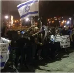  ??  ?? THOUSANDS GATHER at the Shlomo Group Arena in Tel Aviv before a joint Israeli-Palestinia­n Remembranc­e Day ceremony (left) as dozens of far-Right protesters demonstrat­e outside.