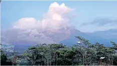  ?? | EPA ?? VOLCANIC materials from Mount Semeru rise in the sky in Lumajang, East Java, Indonesia, yesterday. Authoritie­s has raised Mount Semeru’s alert status to the highest level.