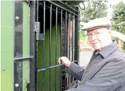  ?? MIKE BAIN/STUFF ?? Colin Isaacs pensively stands outside the secret concrete bunker his brother Richard guarded in WWII.