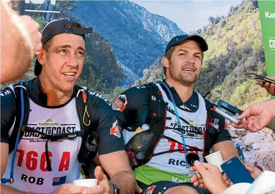  ?? GETTY IMAGES ?? NZ Rugby Players’ Associatio­n chief executive Rob Nichol and former All Blacks captain Richie McCaw address media at the end of the mountain running stage.
