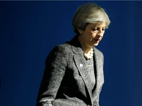  ??  ?? Theresa May’s personal approval ratings have also fallen from a significan­t 56-point lead over the Labour leader in April to 22 points (Reuters)