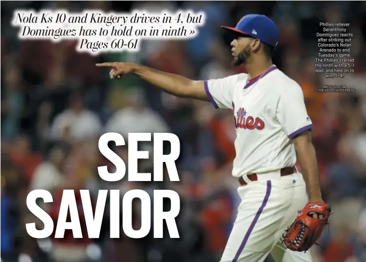  ?? MATT SLOCUM — THE ASSOCIATED PRESS ?? Phillies reliever Seranthony Dominguez reacts after striking out Colorado’s Nolan Arenado to end Tuesday’s game. The Phillies started the ninth with a 5-1 lead, and held on to win, 5-4.