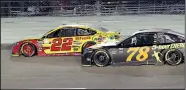  ?? AP/LYNNE SLADKY ?? Martin Truex Jr. (78) finished second behind Joey Logano (22) on Sunday. Truex was in prime position to repeat as Cup Series champion title until a late caution spoiled his plans as he drove the final laps watching Logano pull away.