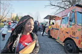  ?? [TOM DODGE/DISPATCH] ?? Rhiannon Childs helped organize Wednesday’s Internatio­nal Women’s Day rally at Goodale Park.