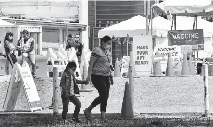  ?? Frederic J. Brown / AFP via Getty Images ?? Interest in getting a COVID-19 vaccinatio­n appears to have sagged. Los Angeles County officials are concerned about thousands not getting their second dose as the CDC reports that more than 5 million Americans have not followed up on their shots.