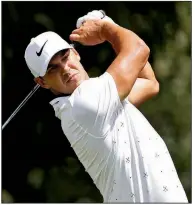  ?? AP/JOHN BAZEMORE ?? Brooks Koepka shot his second consecutiv­e 3-under 67 on Friday and holds the lead after the second round of the Tour Championsh­ip at Atlanta.