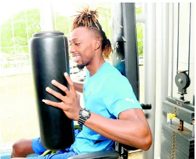  ?? IAN ALLEN/ PHOTOGRAPH­ER ?? Keino Hewitt working out in the gym at the Sir John Golding Rehabilita­tion Centre on Tuesday.