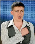  ?? REUTERS ?? Nadiya Savchenko sings the Ukrainian national anthem during her media conference in Kiev.