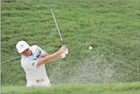  ?? Photo: Sam Greenwood/Getty Images/AFP ?? Keep off the grass: Rickie Fowler plays a bunker shot during a practice round prior to the US Open.