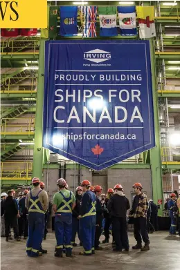  ?? DARREN CALABRESE / THE CANADIAN PRESS ?? Workers gather in the assembly hall at Halifax’s Irving Shipyard Friday, following the announceme­nt that the Navy will receive a sixth Arctic and offshore patrol ship.