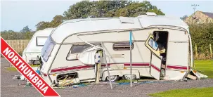  ??  ?? A caravan was wrecked after being blown over by the strong winds at Alnwick