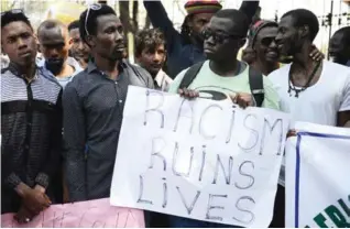  ??  ?? Africans protest in Jantar Mantar