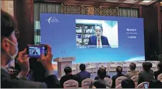  ?? WANG ZHUANGFEI / CHINA DAILY ?? Yukio Hatoyama, former prime minister of Japan, speaks at the forum via a video link.