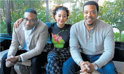  ?? Photo / Getty Images ?? Director George Tillman jnr, left, with actors Amandla Stenberg and Russell Hornsby.