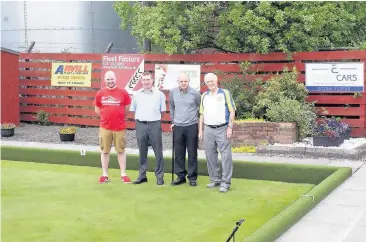  ??  ?? Green for go Participan­ts prepare for the joint bowling day