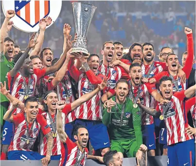  ?? Picture: Getty Images. ?? Atletico Madrid players celebrate their Europa League title win in Lyon.